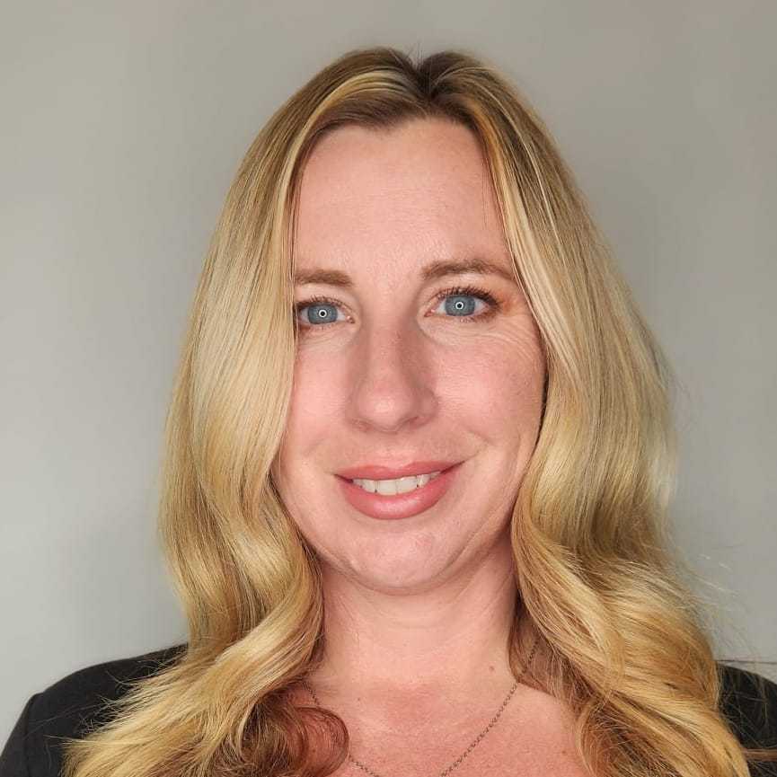 Portrait of Patricia North, a professional stylist at The Greenroom Salon, showcasing their expertise and style.