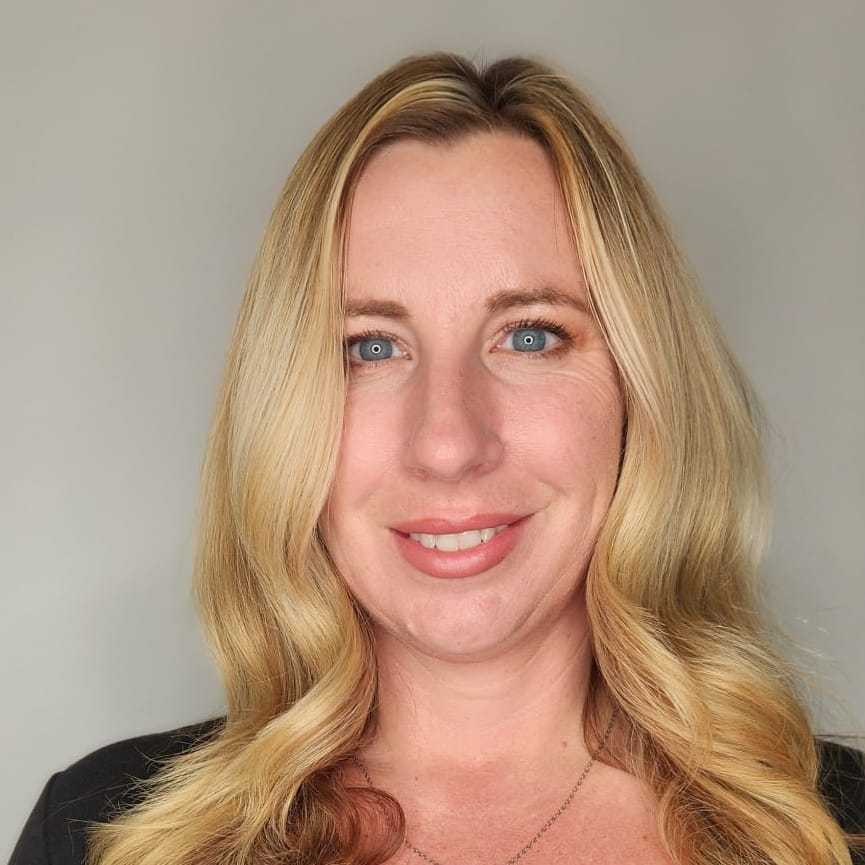 Portrait of Patricia North, a professional stylist at The Greenroom Salon, showcasing their expertise and style.