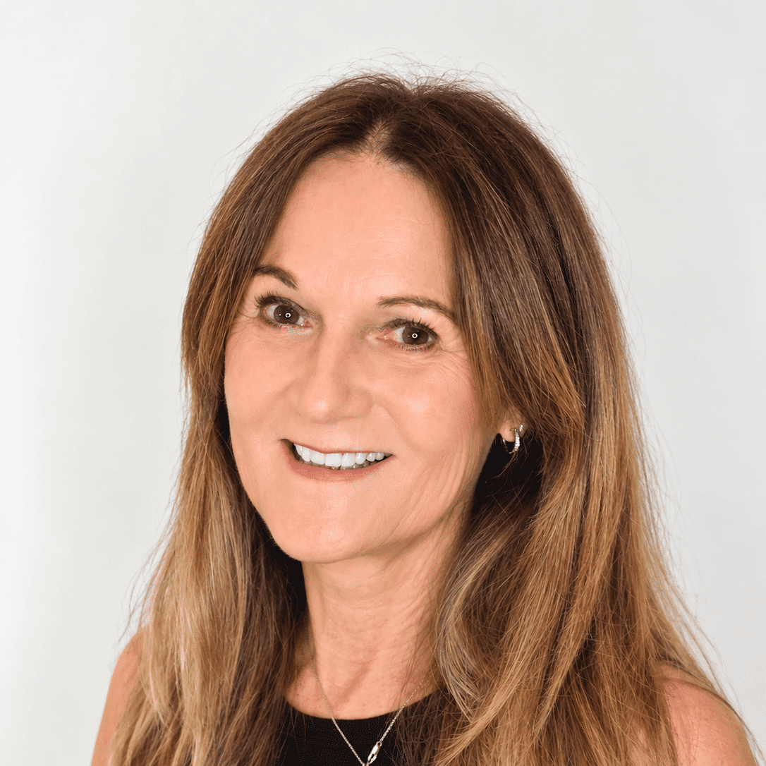 Portrait of Marion, a professional stylist at The Greenroom Salon, showcasing their expertise and style.